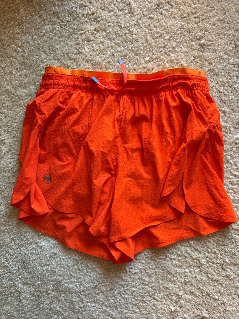 Women's janji multi shorts Orange Run Shorts with Split Hem
